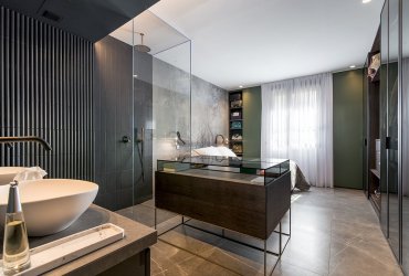 Diseño de dormitorio con baño integrado