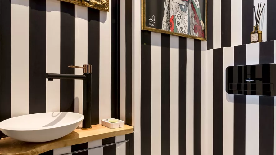 baño moderno integrado en dormitorio