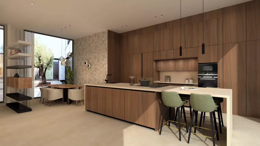 Cocina abierta con isla, diseñada para unir calidez, funcionalidad y continuidad visual