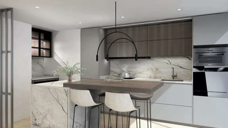 Cocina con isla escultórica, donde materiales y diseño se convierten en protagonistas del espacio