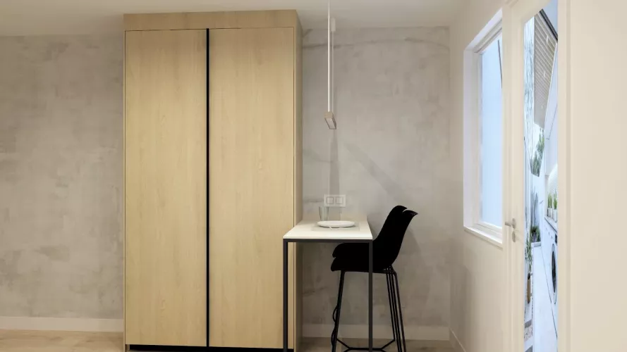 Cocina moderna con acabados en madera y detalles minimalistas