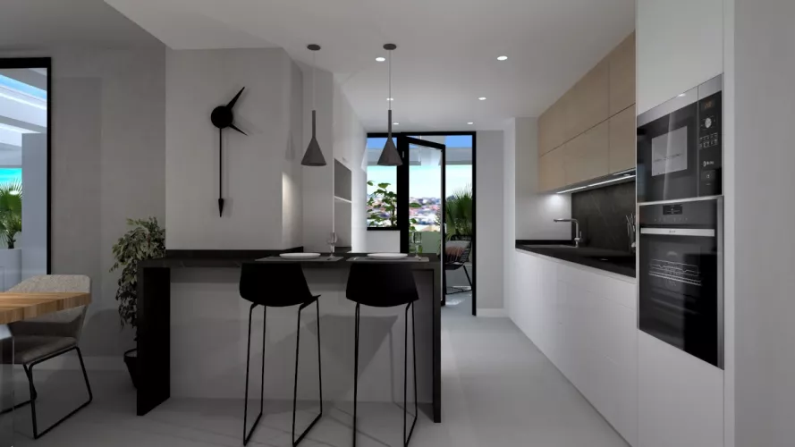Cocina Santos blanca en paralelo con encimera de Neolith