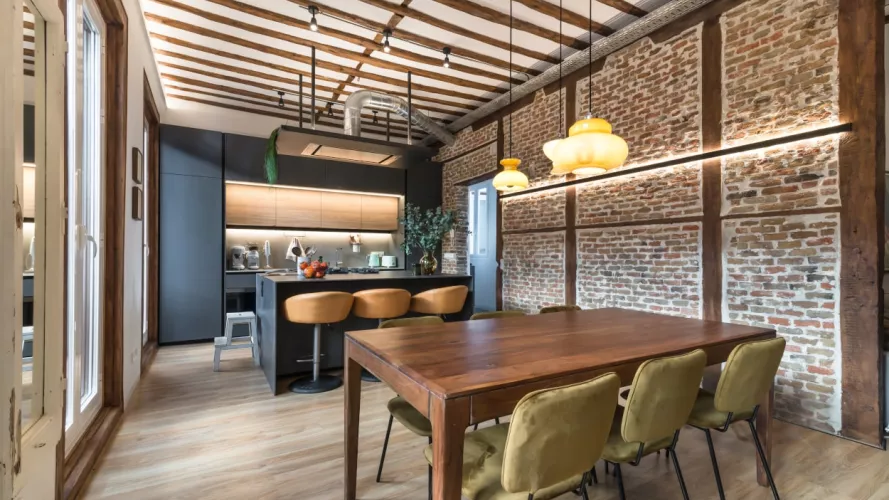 Cocina Santos gris con isla central abierta al salón