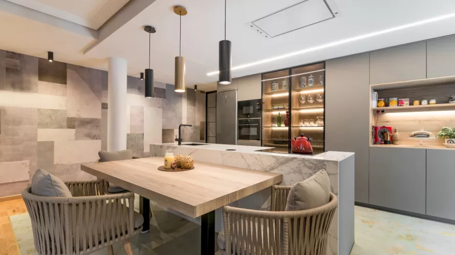 Cocina Santos gris con isla y mesa