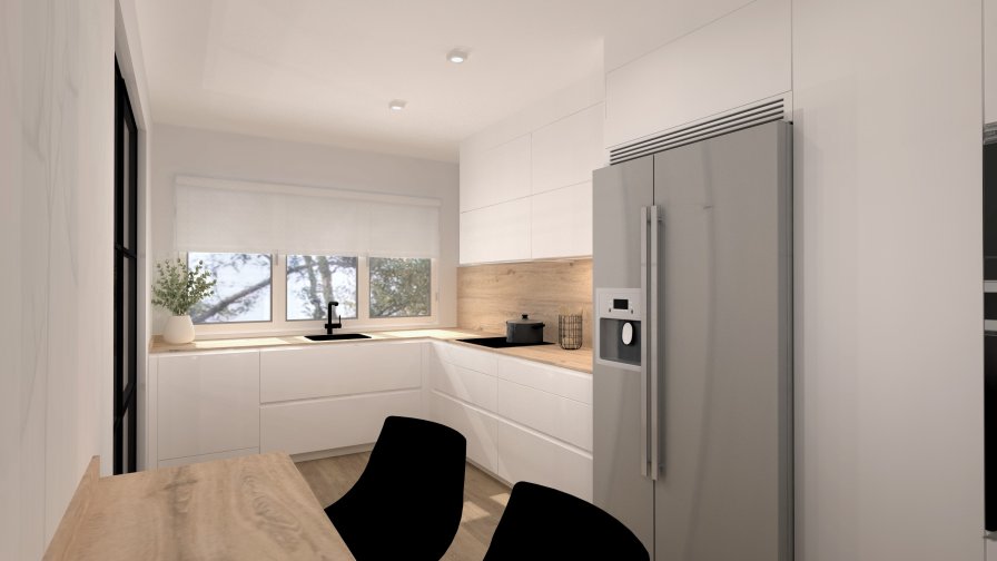 Cocina luminosa con barra integrada y cerramientos de hierro negro