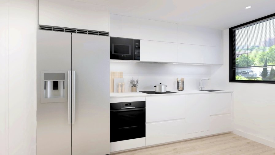 Cocina con isla compacta, diseñada para potenciar la luminosidad y la vida social en un espacio contemporáneo