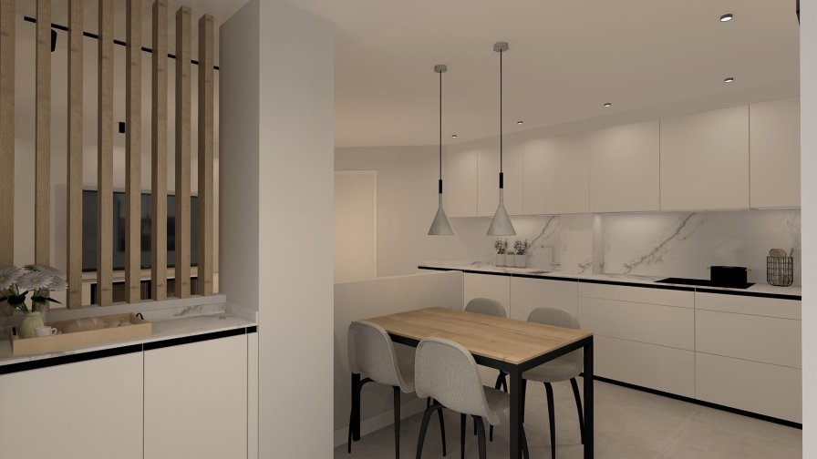 Cocina Santos Blanca Seff semiabierta al salón con electrodomésticos negros y encimera Super Blanco Gris