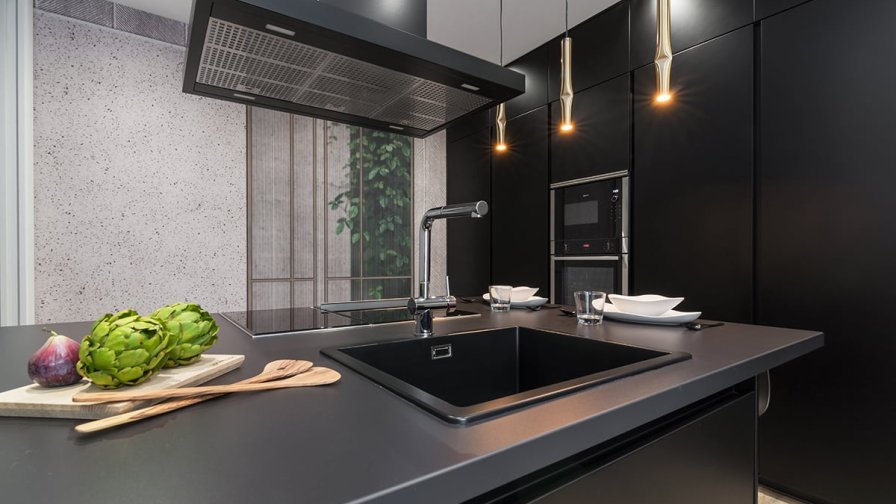 Zona de fuegos y fregadero en cocina