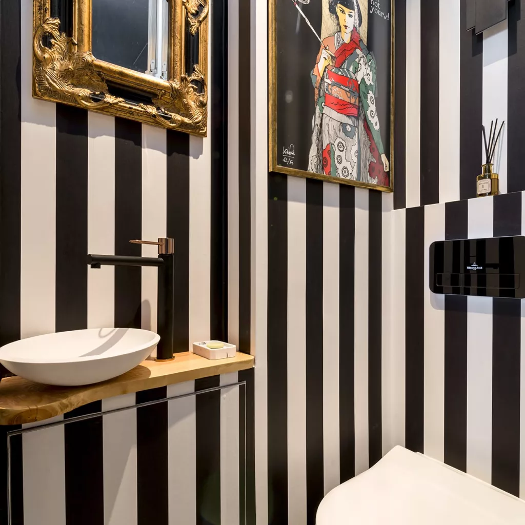 baño moderno integrado en dormitorio