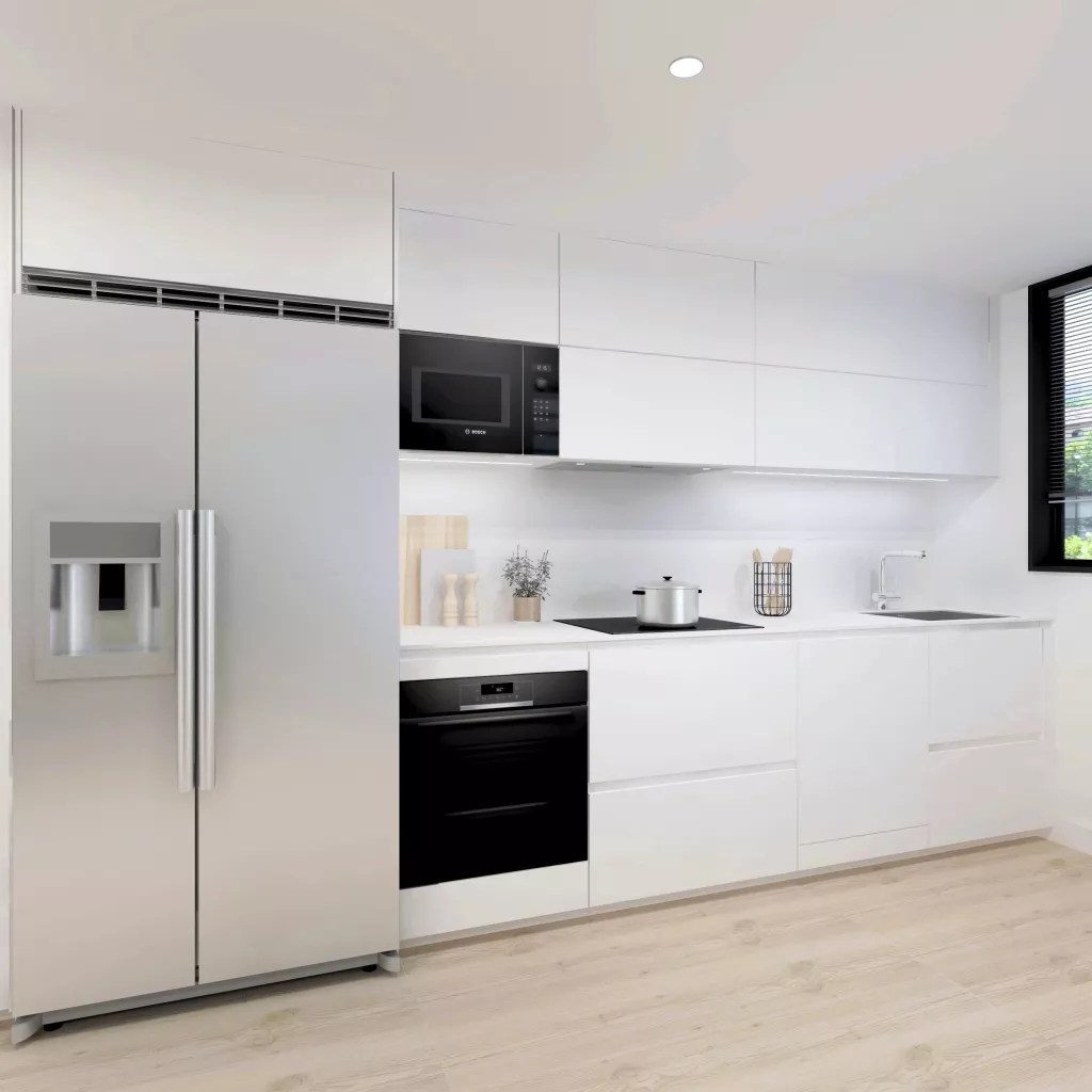 Cocina con isla compacta, diseñada para potenciar la luminosidad y la vida social en un espacio contemporáneo