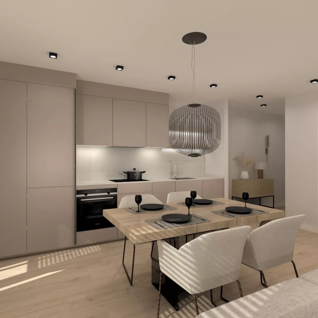 Cocina gris arena con mesa comedor
