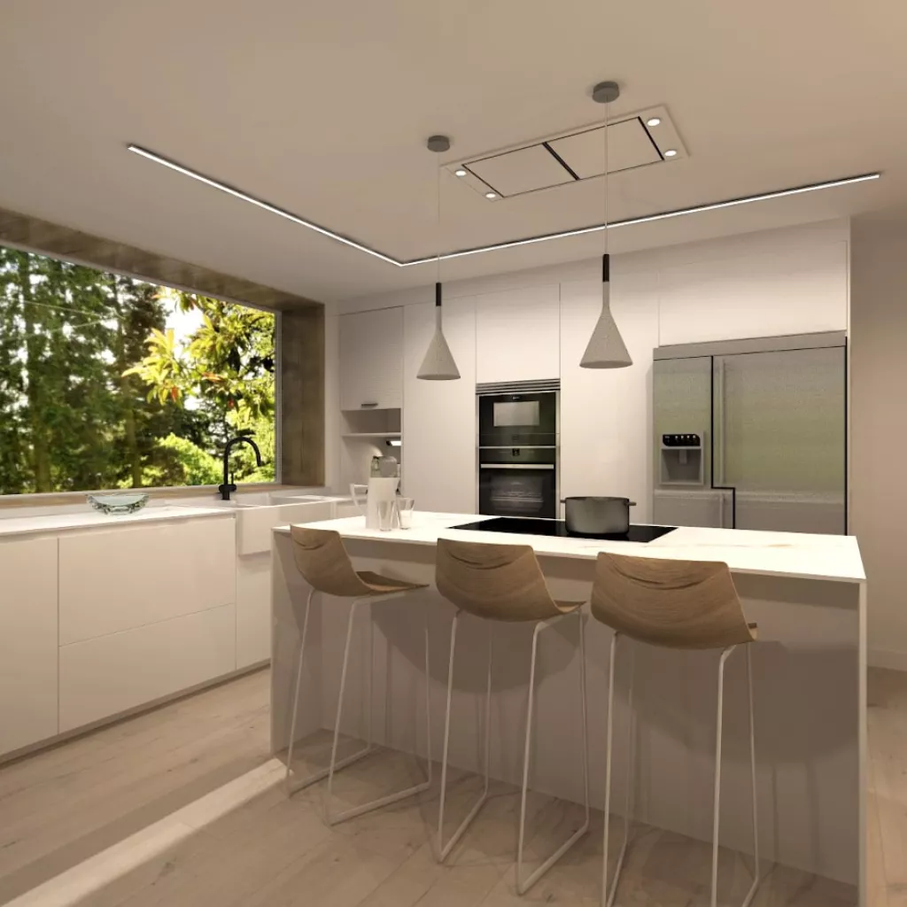 Cocina Santos blanca abierta al salón con encimera de Neolith