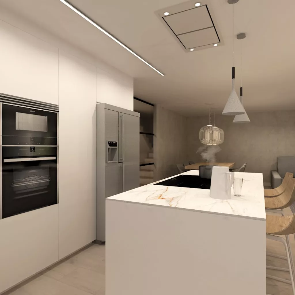 Cocina Santos blanca abierta al salón con encimera de Neolith