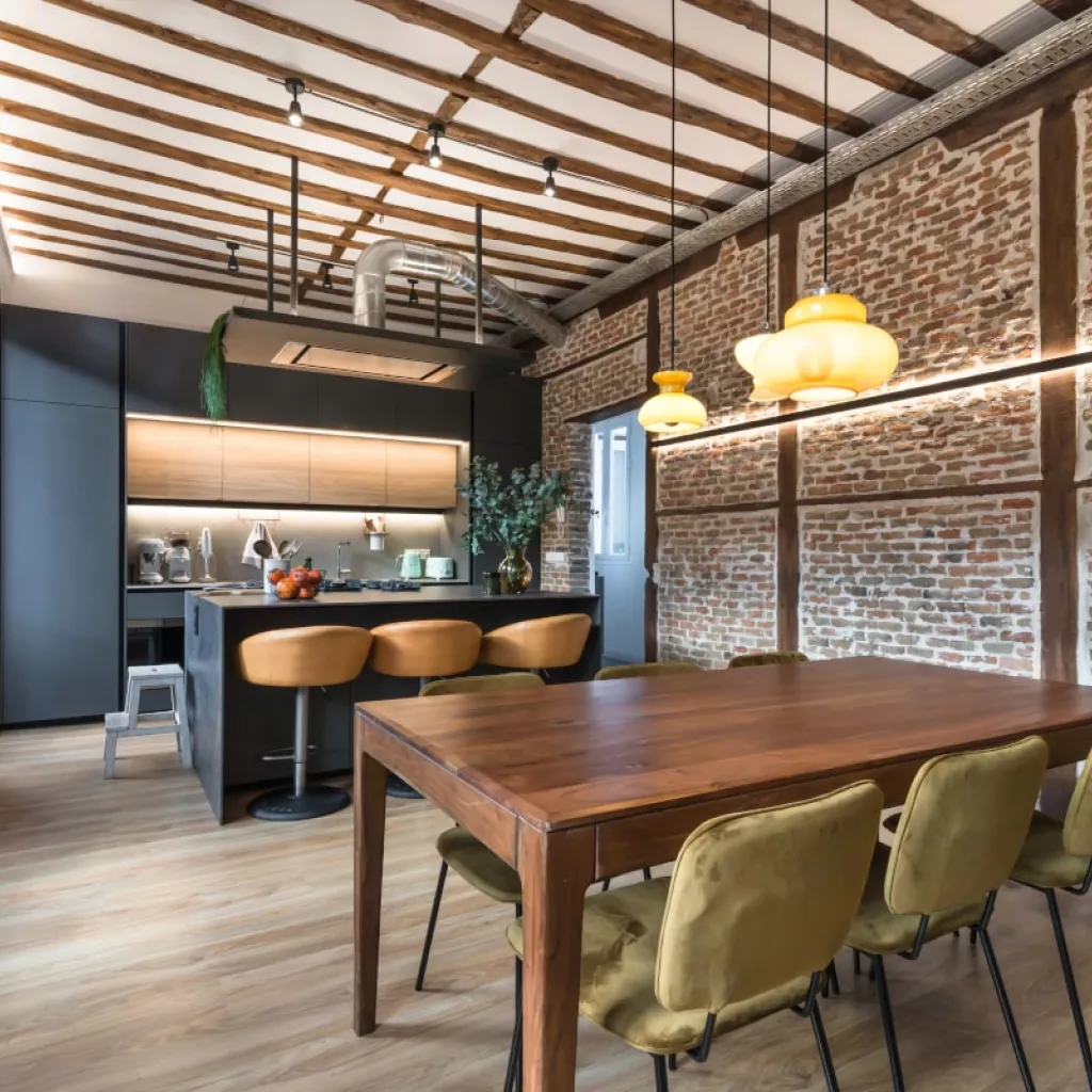 Cocina Santos gris con isla central abierta al salón