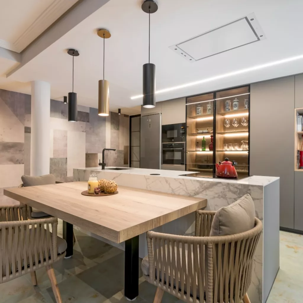 Cocina Santos gris con isla y mesa