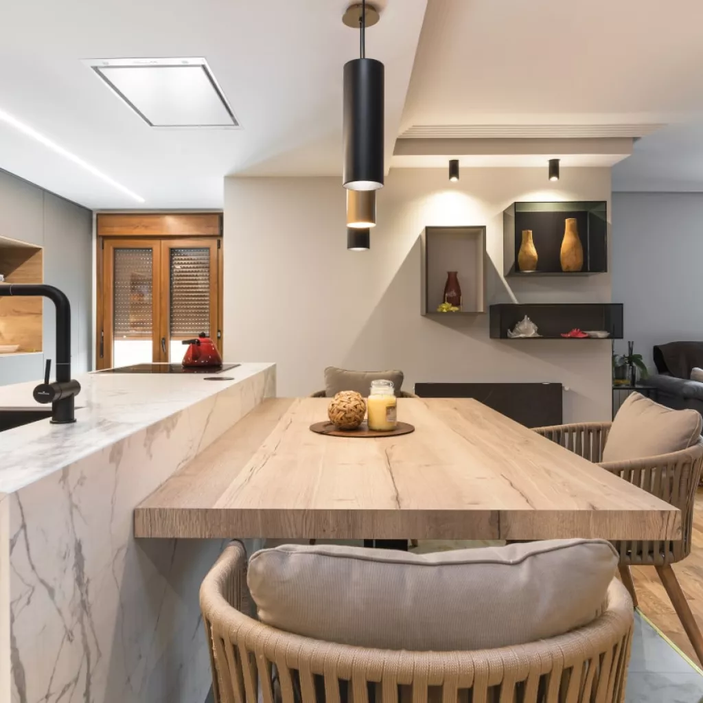 Cocina Santos gris con isla y mesa