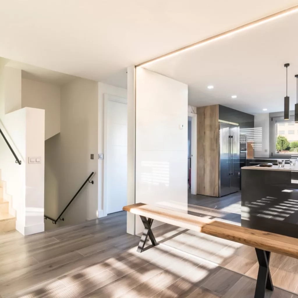 Cocina Santos negra con isla Silestone