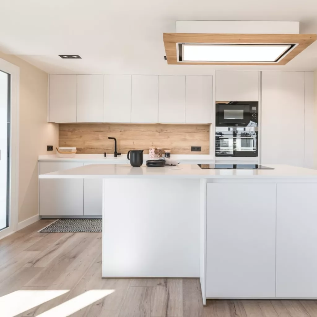 Isla con barra volada en Cocina Santos